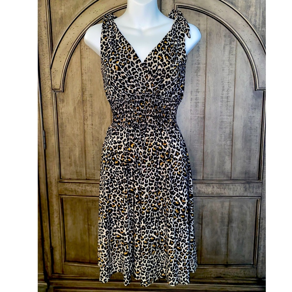 A Mandie Bee dress By: Heartbreaker wiggle dress in leopard print